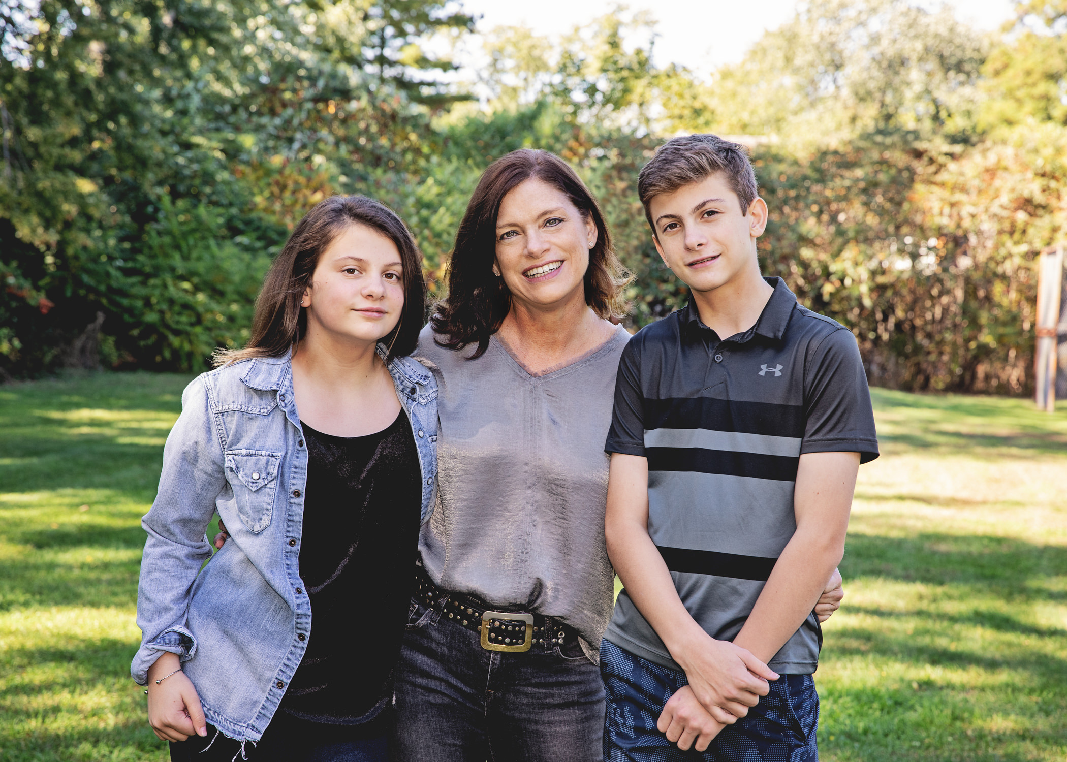 Mum and preteen / teen kids in fall family photo session in oakville
