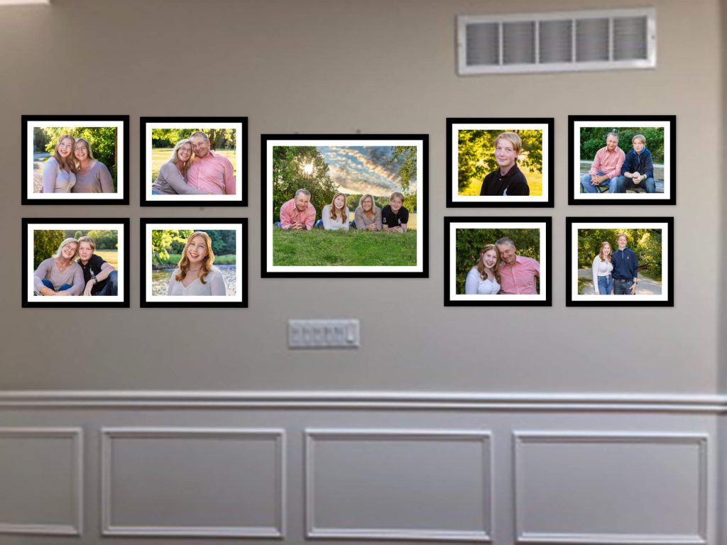 collection of framed family photos on wall in mock up