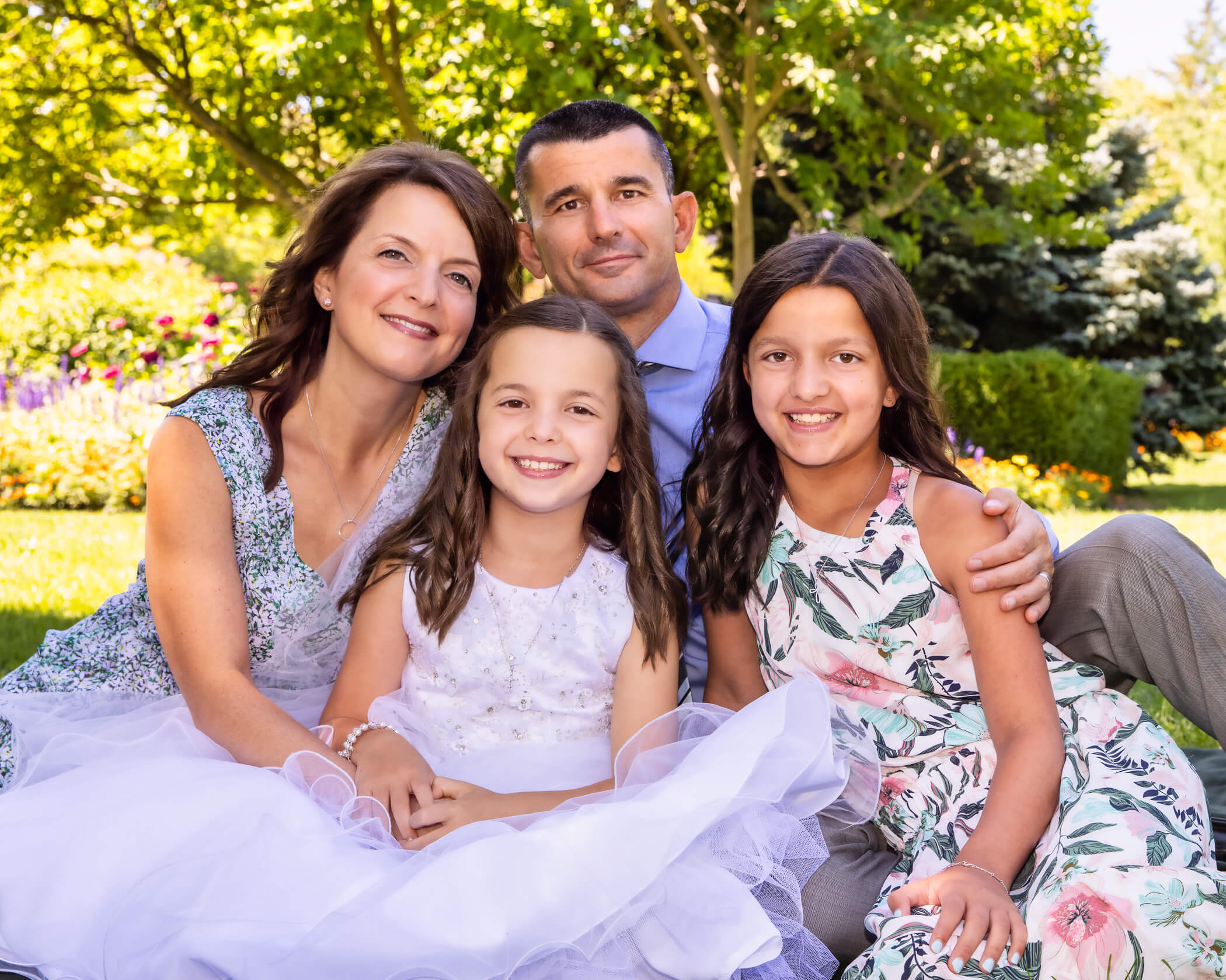 family of four in park