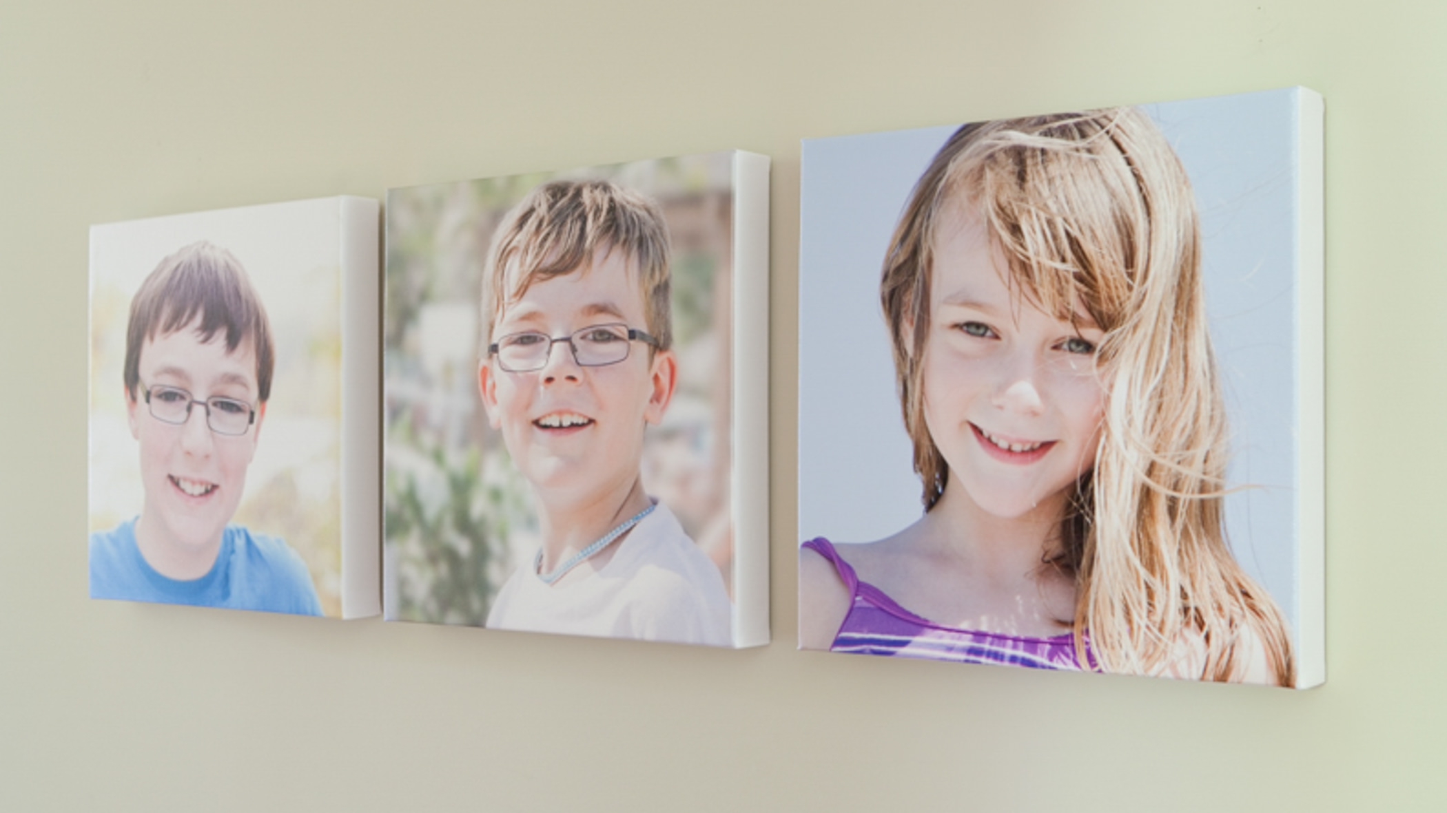 three gallery wrapped canvases